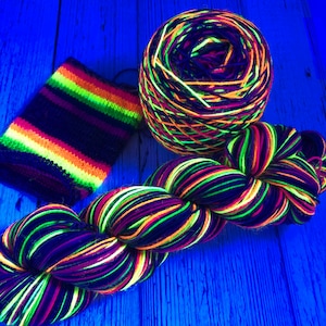 Hand dyed self striping grey, fluorescent rainbow sock yarn