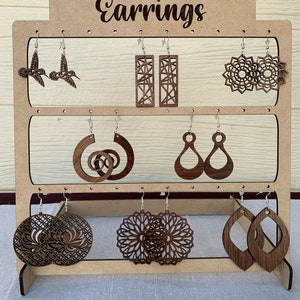 Wooden dangle earrings, delicate laser cut designs with sterling silver hooks. 8 designs to choose from. Free Shipping