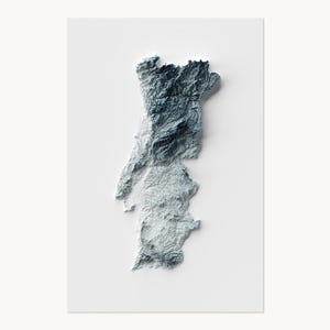 May include: A three-dimensional relief map of Portugal rendered in shades of blue, grey, and white. The topographical surface displays detailed mountain ranges and valleys, creating a textured, elevated effect against a plain white background.