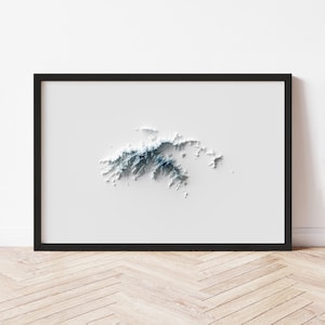 May include: A framed 3D topographic map print. The map depicts a landmass with white and blue shaded relief, set against a white background. The print is encased in a black frame, suitable for wall decor.