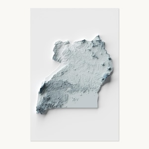May include: A three-dimensional relief map of Uganda rendered in shades of cool blue and white. The map features detailed topographical textures showing mountain ranges and valleys, creating a raised effect against a plain white background.