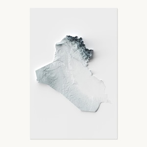 May include: A three-dimensional topographic map of Iraq rendered in shades of white, gray, and dark charcoal. The relief map displays the varied terrain and elevation of the country with a high-contrast finish against a plain white background.