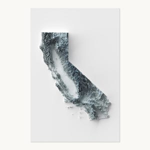 May include: A three-dimensional relief map of California rendered in shades of gray and white. The map features detailed topographical textures showing mountain ranges and valleys, creating a realistic elevation effect on a plain white background.
