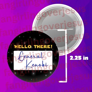 May include: A black and gold button with a white border. The button has a black background with gold stars and the text "HELLO THERE!" in yellow. A white rectangle with the text "General Kenobi" in blue is on the button. The button is 2.25 inches in diameter.