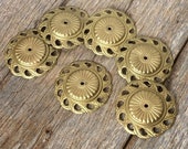 Antique set of 6 gilt repoussé brass decorations with detailed classical motifs for decorating furniture
