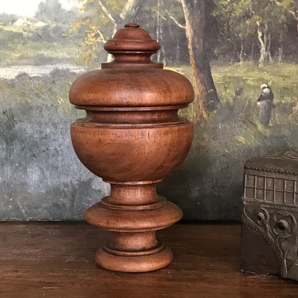 A classic staircase finial - French antique wooden newel post -pillar top garniture element in patinated hardwood.