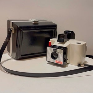 Vintage 60s Polaroid Model 20 &quot;Swinger&quot; was a popular Land Camera and Black Case
