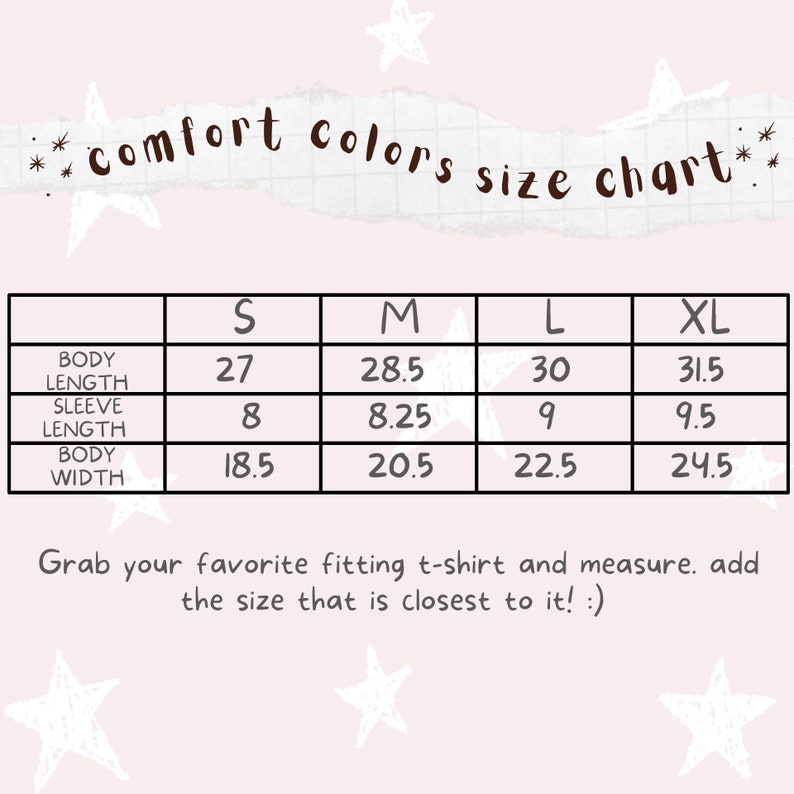 Puede incluir: Una tabla de tallas para camisetas Comfort Colors, con medidas en pulgadas. La tabla incluye largo del cuerpo, largo de manga y ancho del cuerpo para las tallas S, M, L y XL. El texto anima a medir la camiseta favorita para un mejor ajuste.