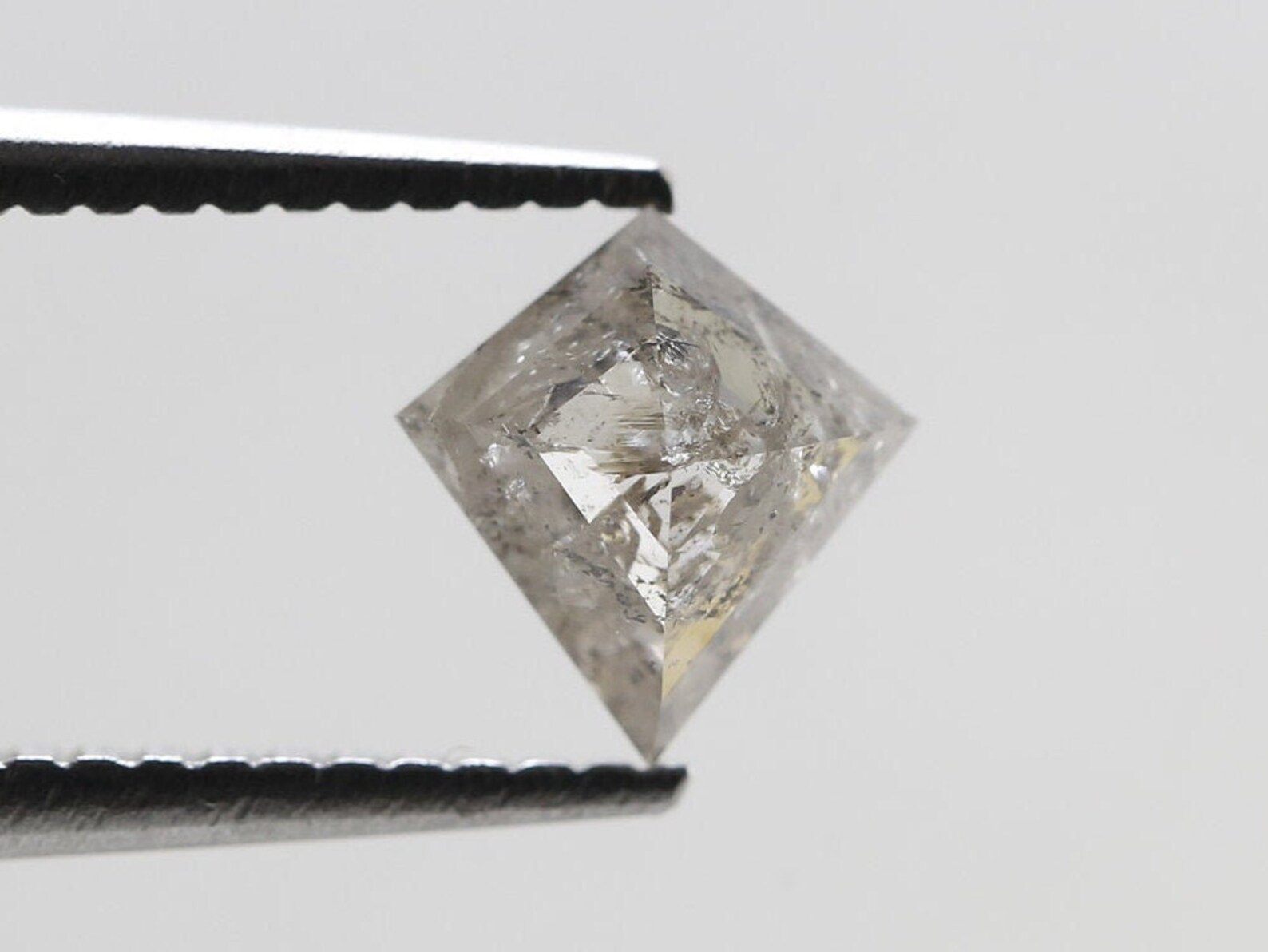 Salt and pepper diamond Kite cut