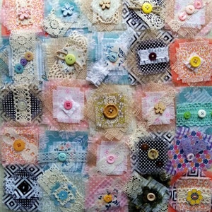 May include: A patchwork quilt made from a variety of fabrics and textures, featuring a range of buttons in different colours and sizes. The quilt is a mix of floral patterns, lace, and geometric designs.