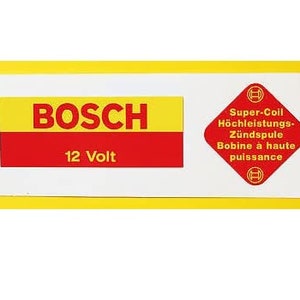 May include: A yellow and red sticker with the text "BOSCH 12 Volt" and a red diamond with the text "Super-Coil Hochleistungs-Zündspule Bobine à haute puissance" in German and French.