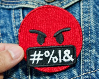 An angry red face emoji patch the ideal gift for lovers of texting with emoticons