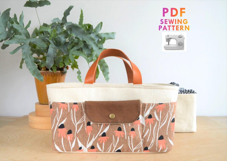 Sewing Pattern for rectangular tote with wide base, crafter's tool bag, easy bag sewing project for beginners, exterior slip pockets back and front, internal pockets for organising bag contents, leather handles to carry, removable shoulder strap that clips on, easy sewing project, beginner level bag pattern, DIY project to make yourself