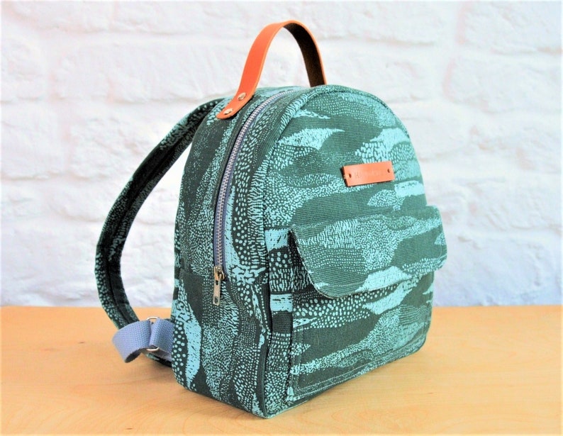 Sewing Pattern for Mini Backpack, child's backpack with round top and wide base, pocket on front with flap, large zipper compartment for books or iPad, small backpack pattern for children, DIY bag pattern, easy backpack to make yourself