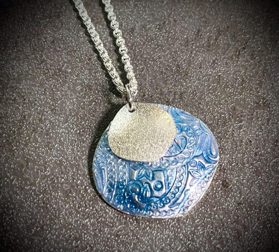 Textured silver and enamel Petal pendant, with sterling silver accent