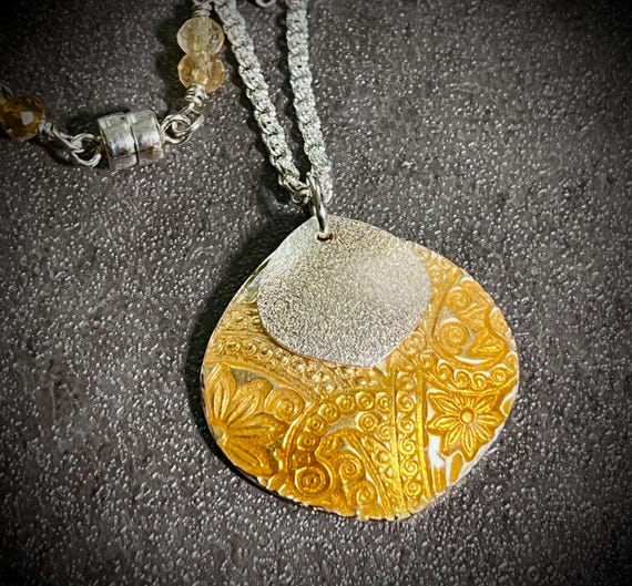 Textured silver and enamel Petal pendant, with sterling silver accent