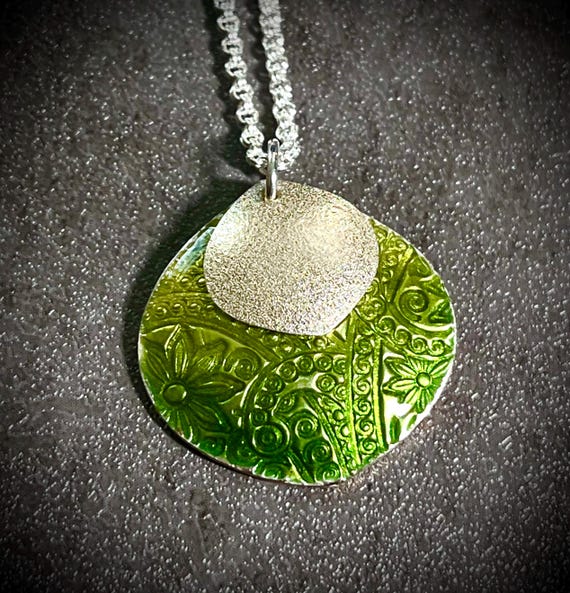 Textured silver and enamel Petal pendant, with sterling silver accent
