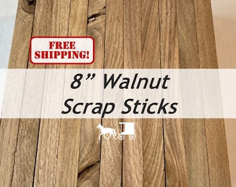 May include: A close-up of a pile of 8-inch walnut scrap sticks. The sticks are arranged in a neat row and have a natural wood grain. The text "FREE SHIPPING!" is visible in the upper left corner of the image. The text "8" Walnut Scrap Sticks" is visible in the center of the image.