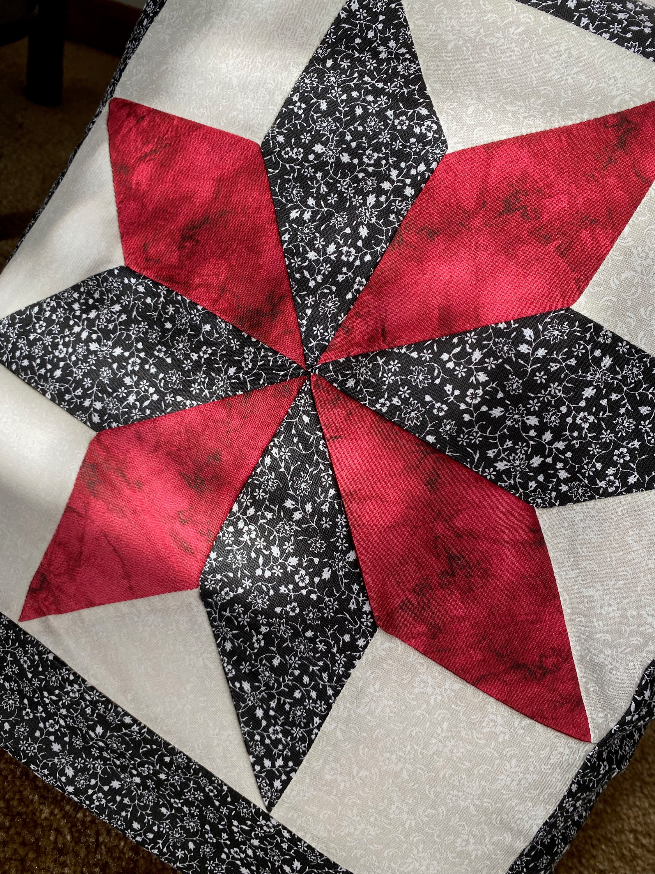 Amish-made Quillow With Red, Black and White Fabrics in a Quilt