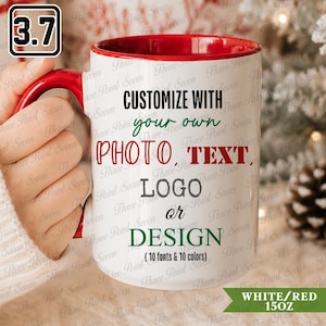 May include: A white ceramic mug with a red interior and handle, featuring the black, green, and red text: CUSTOMIZE WITH your own PHOTO, TEXT, LOGO OR DESIGN (10 fonts & 10 colors). The mug has a 15 oz capacity as indicated by the text on the image.