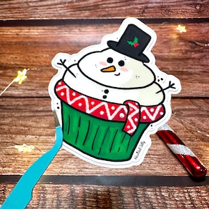 Pegatina de cupcake de muñeco de nieve / Pegatina de invierno navideño / Pegatina de vinilo troquelado navideño / Papelería festiva para hornear, linda pegatina holográfica