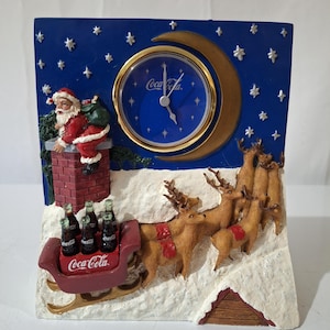Vintage Coca Cola Weihnachtsmann und Rentier Uhr Tischuhr / Manteluhr 1998 Arbeiten