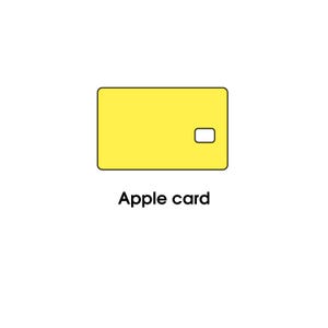May include: A yellow Apple card with a white cutout on the right side. The card is rectangular with rounded corners and a black outline. The words "Apple card" are printed in black below the card.