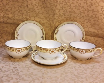 Antique Meito Nippon Demitasse Cup and Saucers Set of Three Hand Painted Gold Flowers Cream Band Shabby Cottage Chic