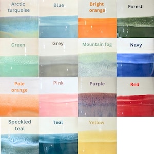 May include: A grid of ceramic tiles with various color swatches. Colors include arctic turquoise, blue, bright orange, forest green, green, grey, mountain fog, navy, pale orange, pink, purple, red, speckled teal, teal, and yellow.