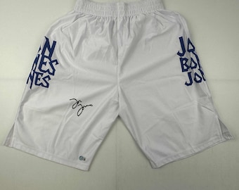 Autographed/Signed Jon Bones Jones Black UFC MMA White Trunks Ultimate Fighting Beckett BAS coa