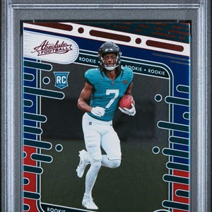 Graded 2024 Panini Absolute Brian Thomas Jr #123 Red/Blue Rookie RC Football Card PSA 10 Gem Mint