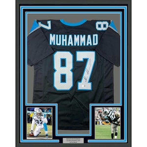 Framed Autographed/Signed Muhsin Muhammad 35x39 Carolina Black Football Jersey Beckett BAS COA