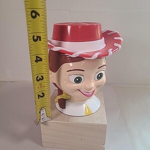 Kubek Vintage Jessie Toy Story Disney na lodzie z klapką Pixar zdjęcie 2