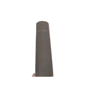 May include: A dark brown book with the word "BIJBEL" printed on the spine.