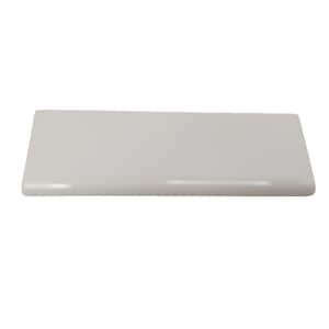 May include: A rectangular, off-white ceramic tile with a smooth, glossy surface. The tile has rounded edges and a simple, minimalist design. This tile is suitable for various home improvement projects.
