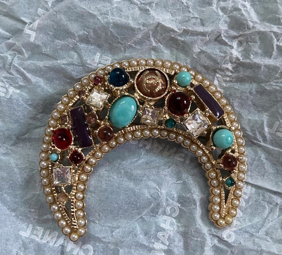 chanel moon brooch