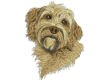 May include: Embroidered image of a brown and white dog with curly fur. The dog is looking to the left of the image with its tongue sticking out.