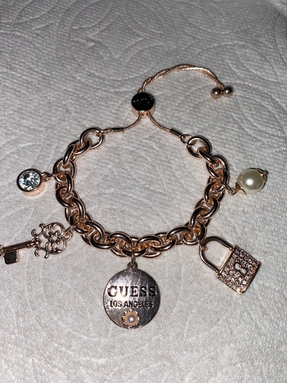 Guess Rose Gold Tone Charm Bracelet 