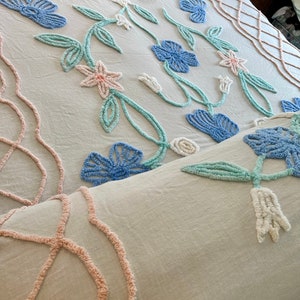 Vintage Cottage Chenille Bedspread with Large Gorgeous Blue, Yellow and White Florals on a white canvas in VGC