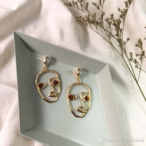 gold face earrings, gold eye, picasso earrings, minimalist trendy earrings, shape earrings, gold dangling earrings, picasso studded earrings