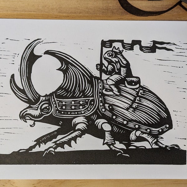 Black and white linocut beetle print, "We Ride at Dawn!" Goblincore beetle rider,  The Toad Prince, Original nature-inspired linocut