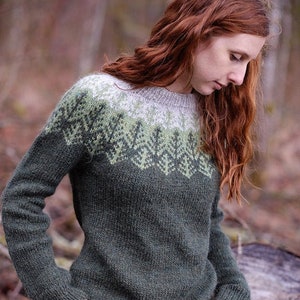 Green lopapeysa or lopi sweater in icelandic wool