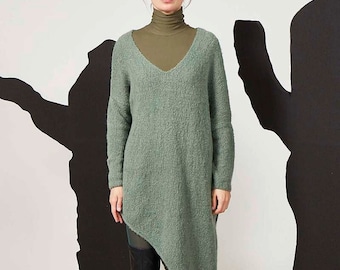 Hand knitted asymmetrical sweater tunic in baby alpaca yarn. Available in 24 colours