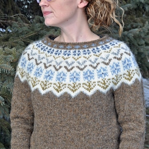 Brown lopapeysa or lopi sweater with floral motifs