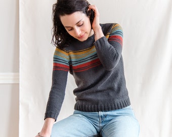Pull raglan classique tricoté à la main à rayures en laine mérinos