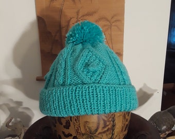 Cable hand knitted hat