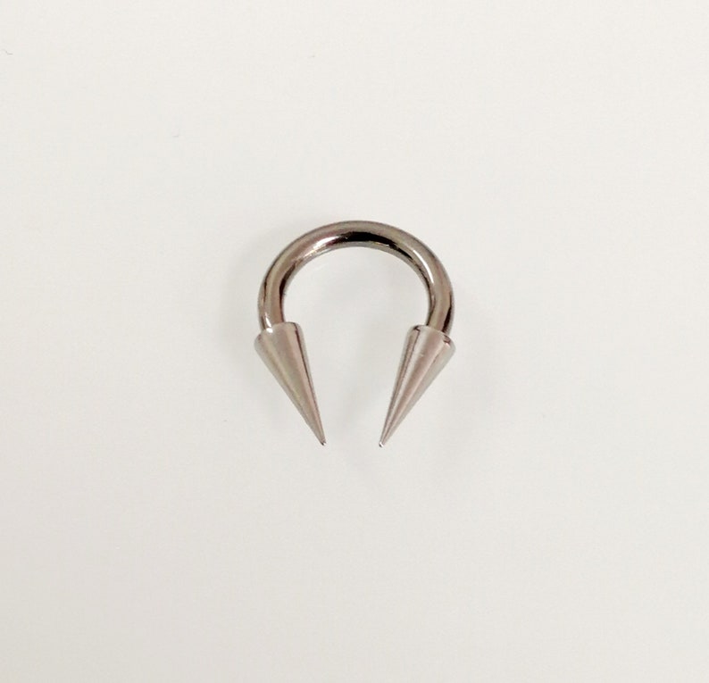 Free shipping Septum Gift men women 1.6mm Very Long spikes Circular barbell Extreme Horseshoe Titanium Hypoallergenic barbell 14g