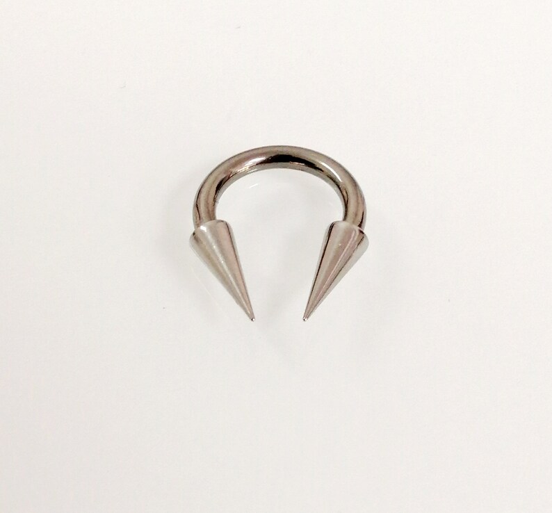 Free shipping Septum Gift men women 1.6mm Very Long spikes Circular barbell Extreme Horseshoe Titanium Hypoallergenic barbell 14g
