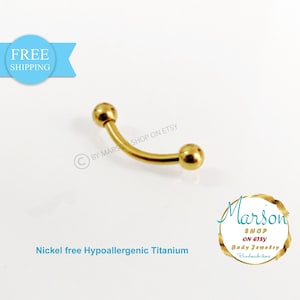 Puede incluir: Barbell curvado de titanio de color dorado con dos bolas redondas. Sin níquel e hipoalergénico. "Marson Shop on Etsy Joyería corporal Artículos hechos a mano"