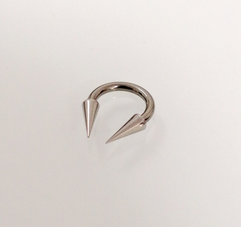 Free shipping Septum Gift men women 1.6mm Very Long spikes Circular barbell Extreme Horseshoe Titanium Hypoallergenic barbell 14g